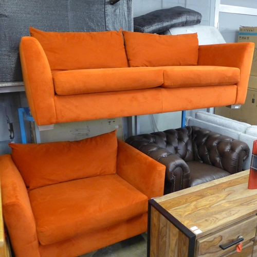 1494 - A tangerine velvet four seater and two seater sofa