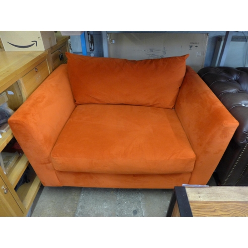 1494 - A tangerine velvet four seater and two seater sofa