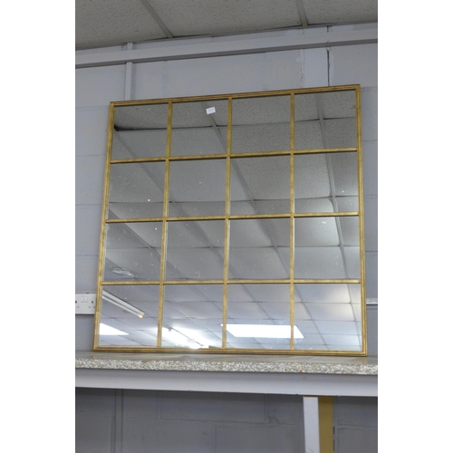 1415 - A large gold framed window mirror