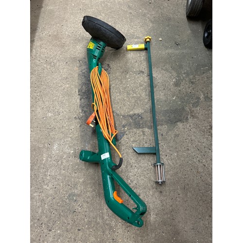 2230 - A weed puller and a Black & Decker strimmer