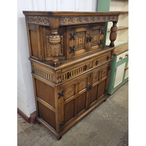 175 - A 17th Century style carved oak six piece dining suite, comprising; refectory table, four chairs and... 