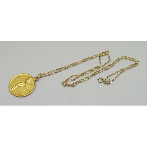 1003 - A 9ct gold Virgo Zodiac medallion by Paul Vince on a 9ct gold chain, 7.5g