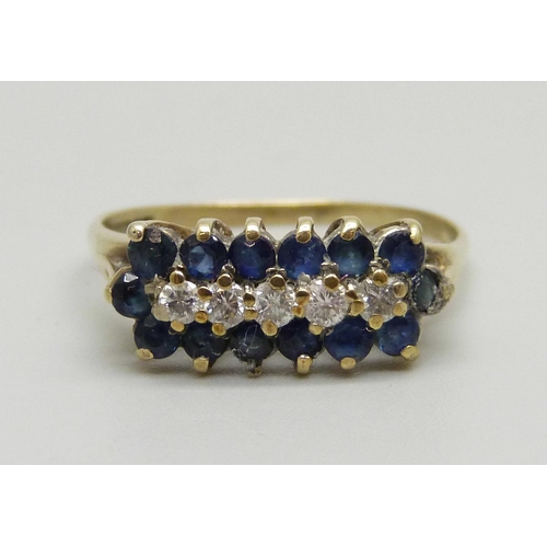 1015 - A 9ct gold, three row fourteen sapphire and five diamond ring, 1.9g, P/Q