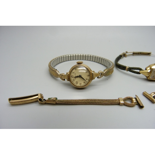 1024 - A lady's 14ct gold Bulova wristwatch, a Hamilton wristwatch and a bracelet