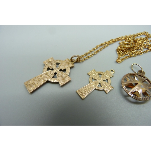 1030 - A 9ct gold Maltese Cross pendant and two 9ct gold cross pendants, 4.2g, one on a plated chain