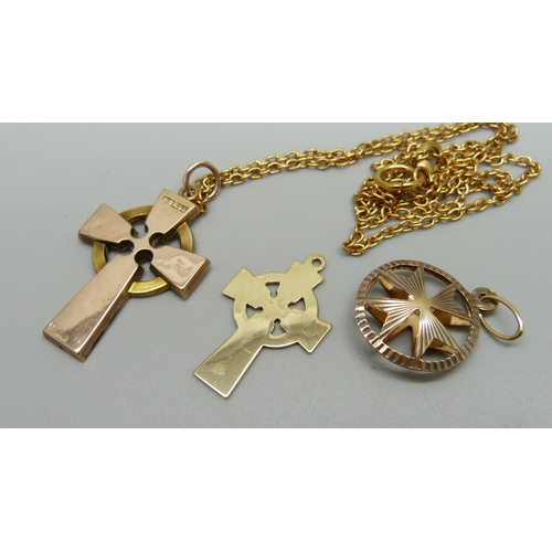 1030 - A 9ct gold Maltese Cross pendant and two 9ct gold cross pendants, 4.2g, one on a plated chain