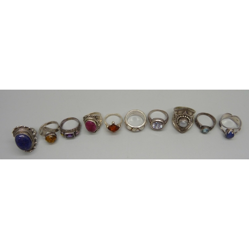 1044 - Ten silver stone set rings, 59g