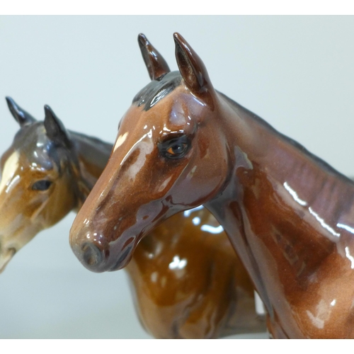 607 - Three Beswick horses including Mill reef, one leg a/f