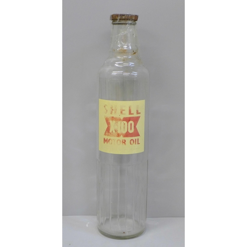 609 - A Shell X-100 motor oil bottle