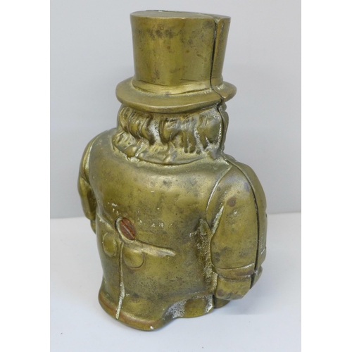 632 - A brass Transvaal money box, a brass Buddha and a wooden handled seal