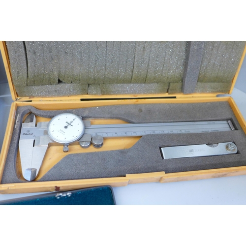 636 - A cased Kern technical drawing set, a dial caliper and one other instrument