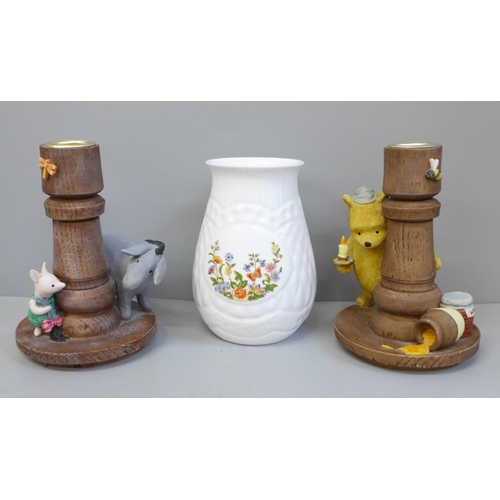 650 - Two Border Fine Arts Winnie The Pooh candlesticks and an Aynsley vase