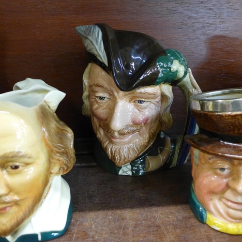 656 - A collection of character jugs, including Royal Doulton and Beswick; Robin Hood, Merlin, Rip Van Win... 