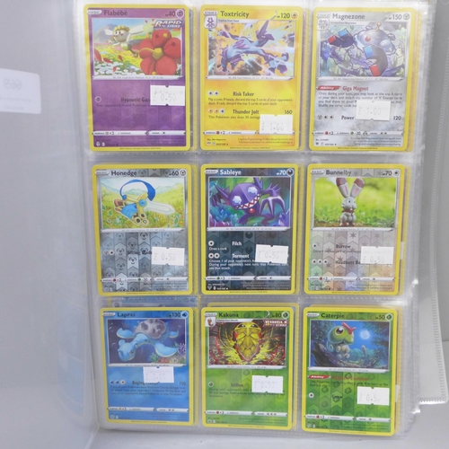 669 - 270 Holographic Pokemon cards in folder