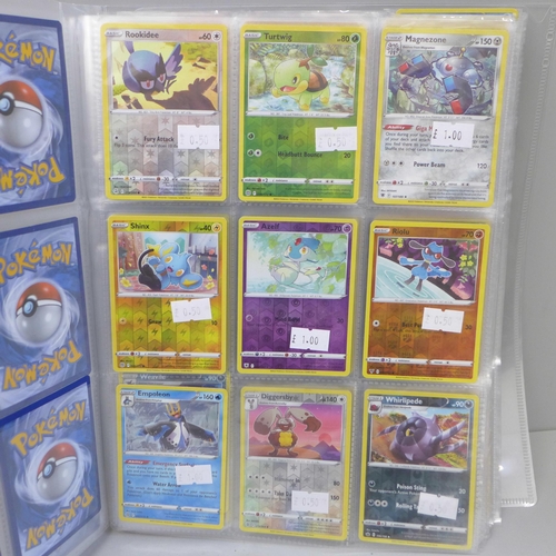 669 - 270 Holographic Pokemon cards in folder