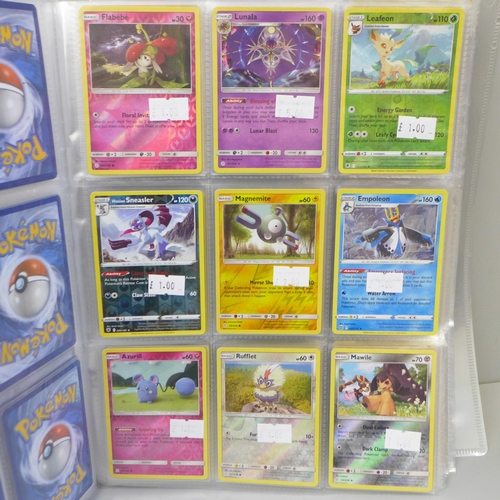 669 - 270 Holographic Pokemon cards in folder