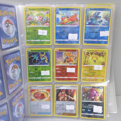 669 - 270 Holographic Pokemon cards in folder