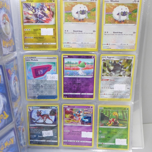 669 - 270 Holographic Pokemon cards in folder