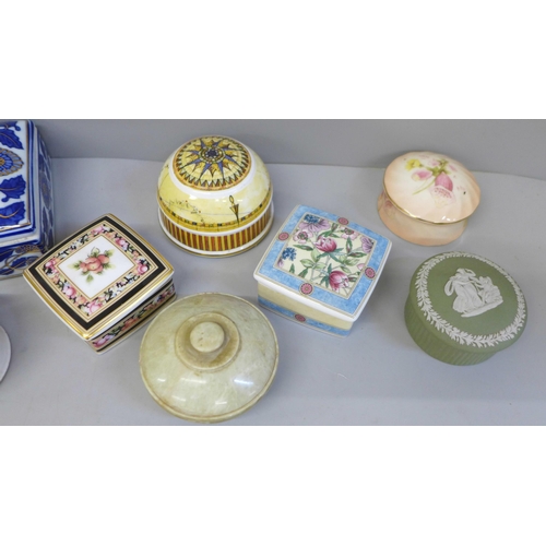 670 - Seven trinket boxes and a paperweight