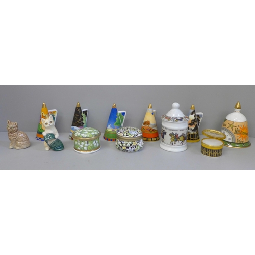 673 - Five Royal Worcester commemorative candle snuffers, a Royal Doulton cat figure, another cat figure, ... 