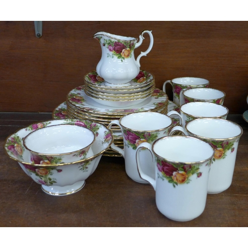 675 - A collection of Royal Albert Old Country Roses china including five saucers, six mugs, sugar bowl, m... 