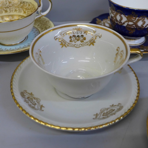 676 - Seven cups and saucers including four Aynsley