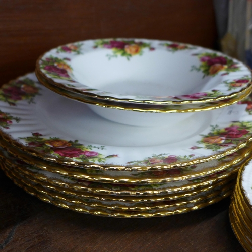 684 - A collection of Royal Albert Old Country Roses including six dinner plates, five small bowls, two la... 