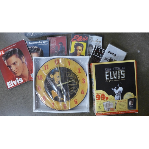 703 - Elvis collectables; two Life Publications, Your Guide to Elvis, wall clock, singing and dancing Tedd... 