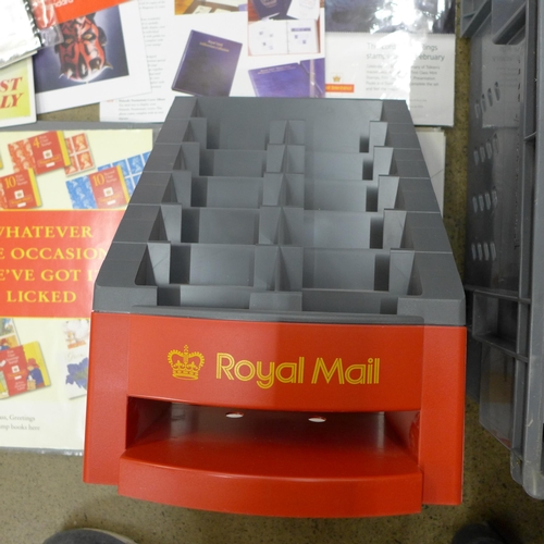 710 - Stamps; Royal Mail items including booklet stand, promotional material, etc., in a plastic Royal Mai... 