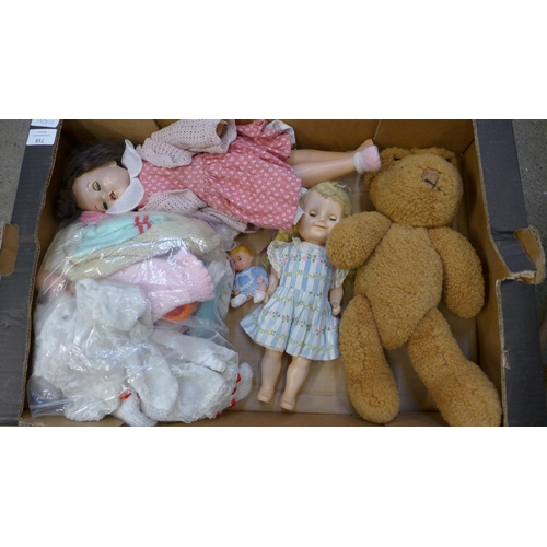 718 - A collection of vintage dolls and a high chair