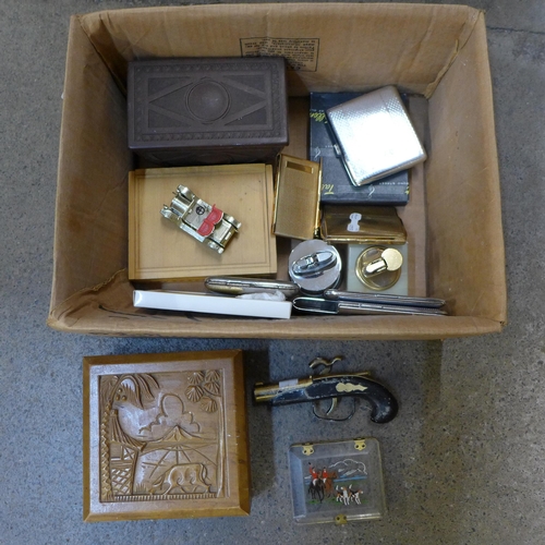 725 - A collection of smoking items including cigarette cases, tobacco box, lighters, etc.