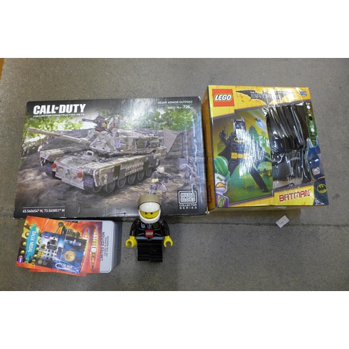 727 - A Call of Duty Mega Blocks set, Lego Batman movie outfit and Lego torch, Dr. Who items, etc.