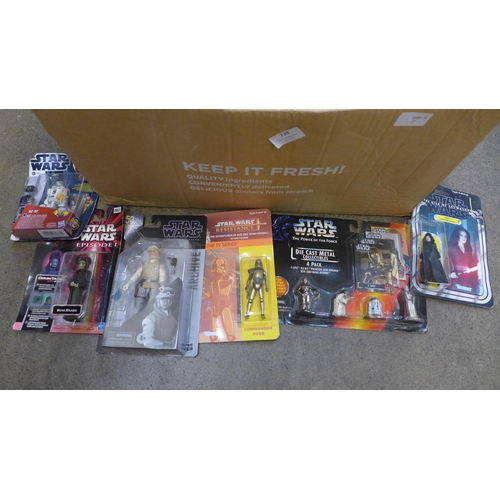 728 - A collection of Star Wars items including Hasbro figures, a 1995 Kenner lead figure set, Millennium ... 