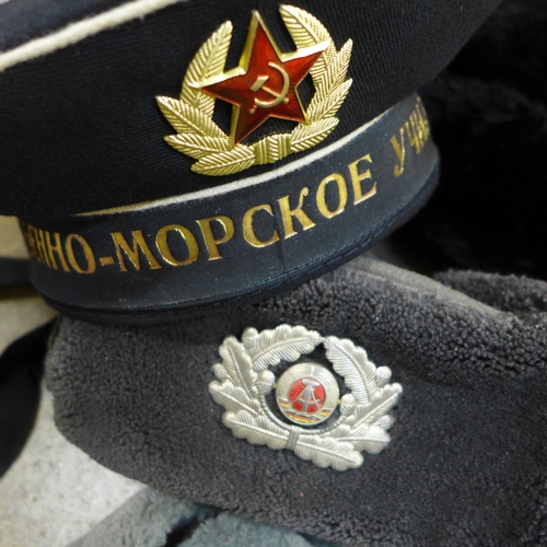 732 - A collection of military hats including Soviet Navy