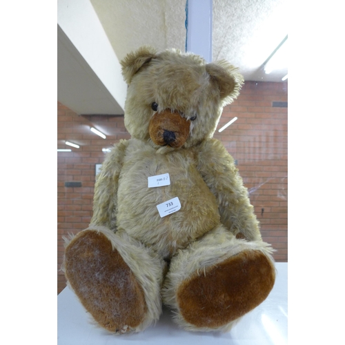 733 - A large vintage Teddy bear with growler