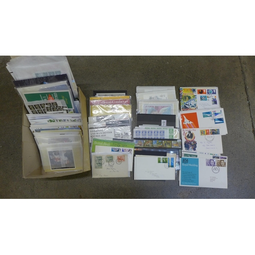 735 - Stamps; a box of GB stamps, covers, year packs, presentation packs, etc.