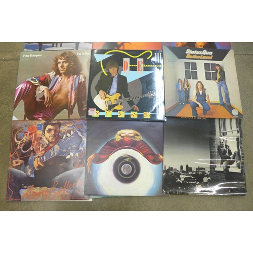 736 - Fifteen rock LP records including US, The Police, Rainbow, Genesis, Dire Straits, etc.