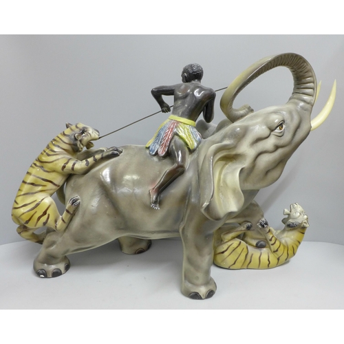 780 - An elephant figure group, 46cm wide