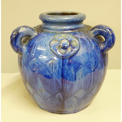 801 - A Danesby Ware three handed blue vase