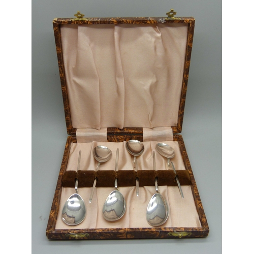 825 - A set of six Francis Howard corinian silver spoons, 48g