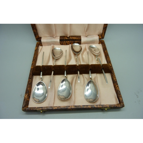 825 - A set of six Francis Howard corinian silver spoons, 48g