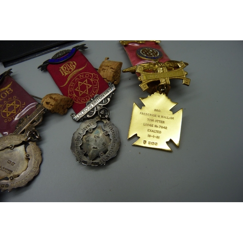 828 - Four silver lodge medals, one with three 9ct gold bars