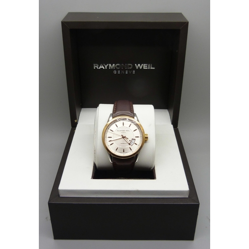 834 - A gentleman's Raymond Weil automatic wristwatch, boxed, a/f, crown loose * this lot is subject to VA... 