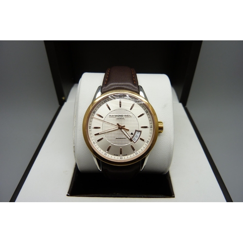 834 - A gentleman's Raymond Weil automatic wristwatch, boxed, a/f, crown loose * this lot is subject to VA... 