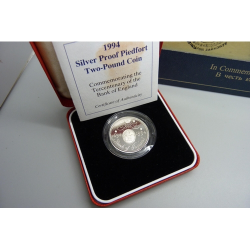 836 - Two silver proof piedfort coins; £1 and £2 and a limited edition sterling silver Space Mission comme... 