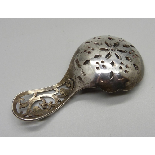 841 - A pierced silver caddy spoon, Sheffield 1938, 26g