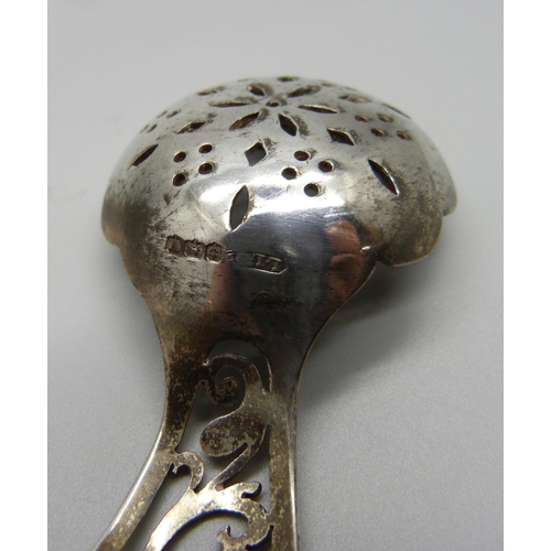 841 - A pierced silver caddy spoon, Sheffield 1938, 26g