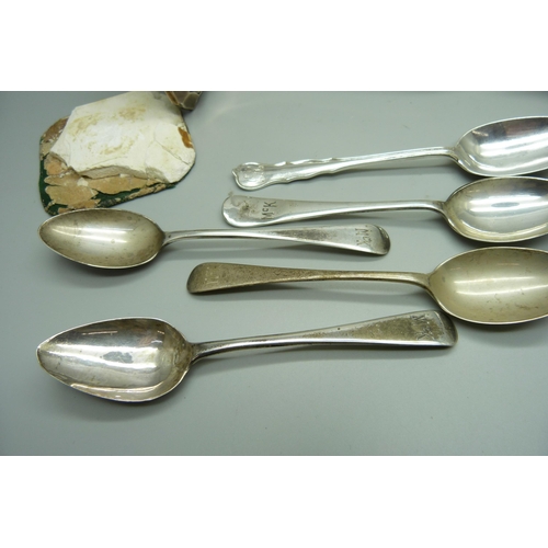 845 - Five silver spoons, 90g, and a silver candlestick a/f