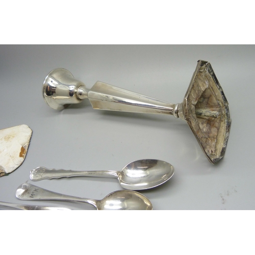 845 - Five silver spoons, 90g, and a silver candlestick a/f