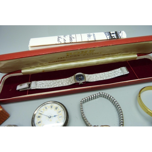 853 - A lady's 9ct gold wristwatch, a 9ct gold bracelet, 4.7g, a silver and gold stone ring, a silver fob ... 